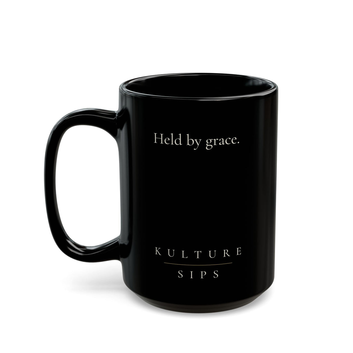 Carried Grace Collection black ceramic mug with “Held by grace” message and Kulture Sips branding