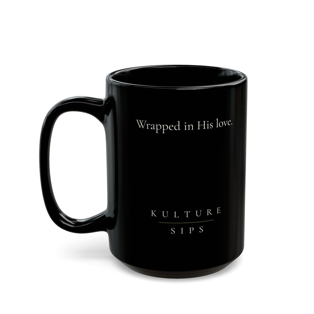 Covered Grace Collection black ceramic mug with “Wrapped in His love” message and Kulture Sips branding